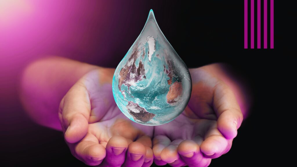 Two hands and a drop of the earth